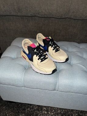Nike Cream Black Sneakers with Blue Swoosh and Pink Accents